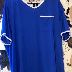 Blue/white shirt.